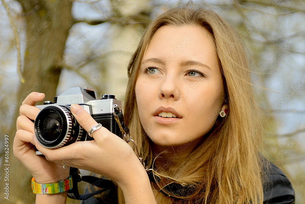 blonde girl in autumn park
