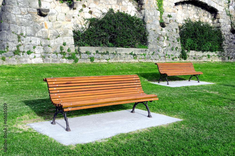 wooden benches on a garden wooden benches on a garden
