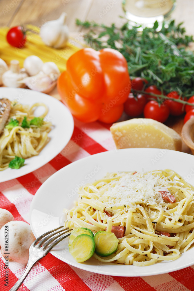 Pasta carbonara on the wooden table Pasta carbonara on the wooden table