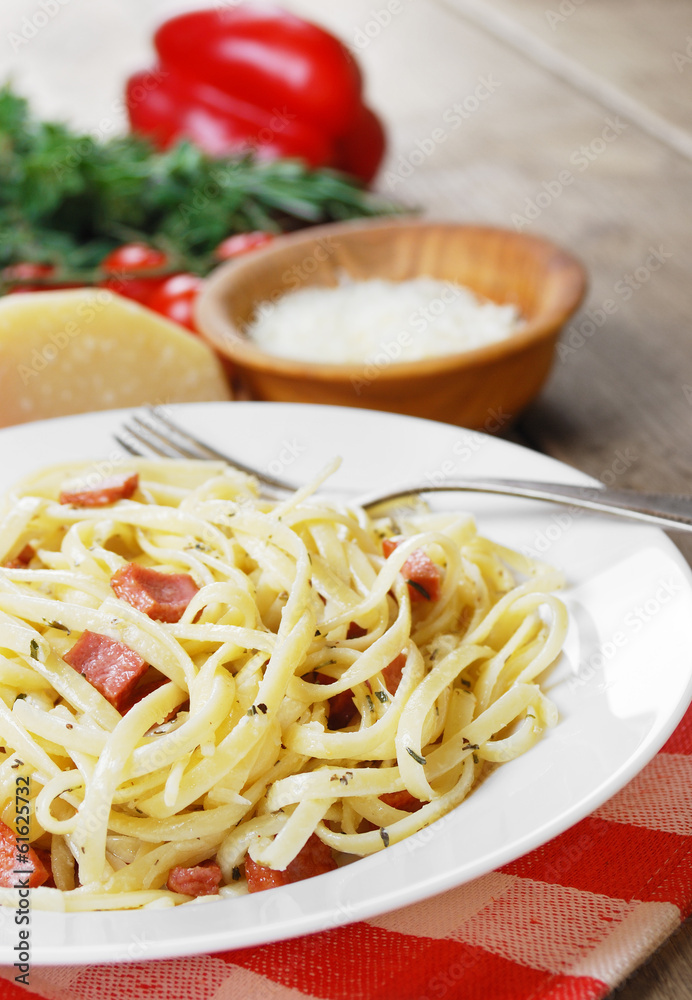 Pasta carbonara on the wooden table Pasta carbonara on the wooden table