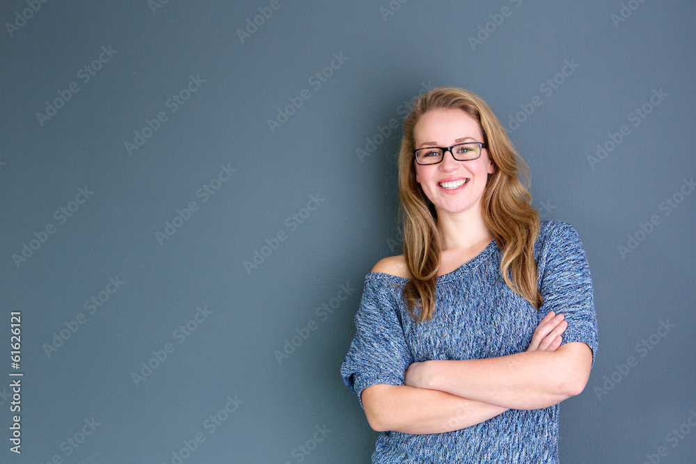 Business woman standing against gray background Business woman standing against gray background