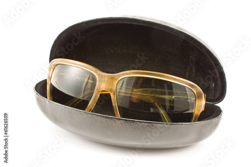 Sunglasses in spectacle case isolated on white