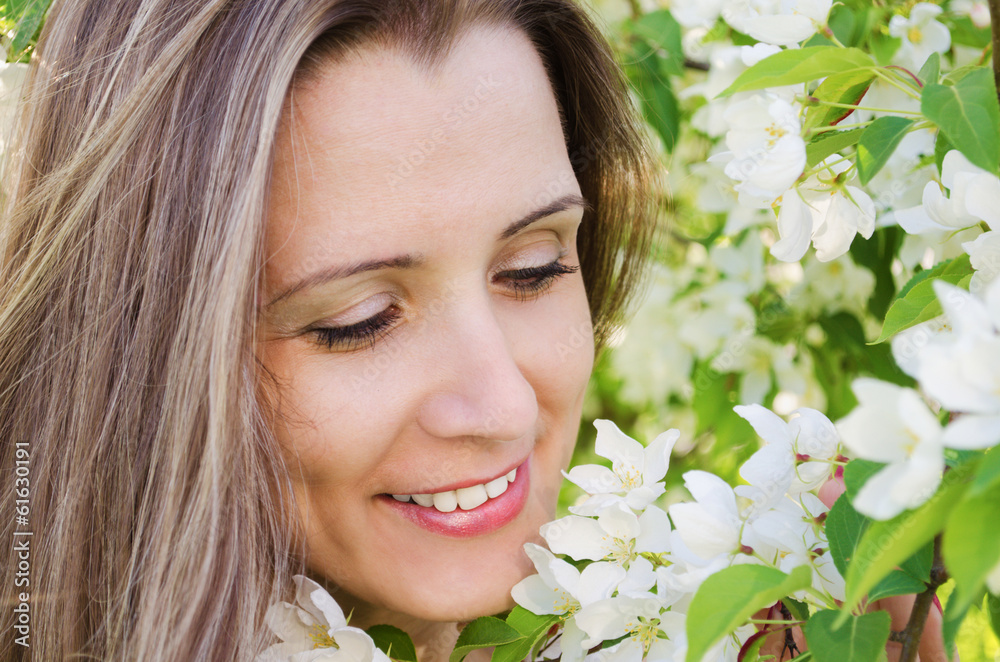 Portrait woman with apple tree flowers Portrait woman with apple tree flowers