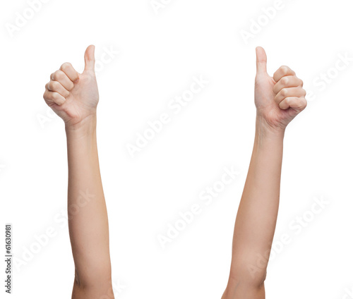 woman hands showing thumbs up