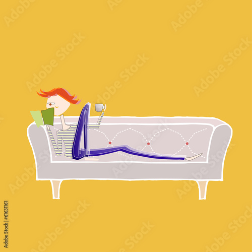 girl reading on sofa with a cup of coffee