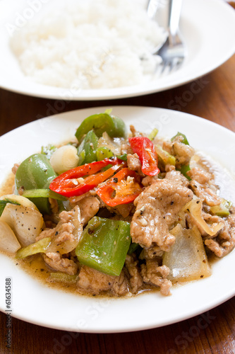 Fried pork with sweet peppers.