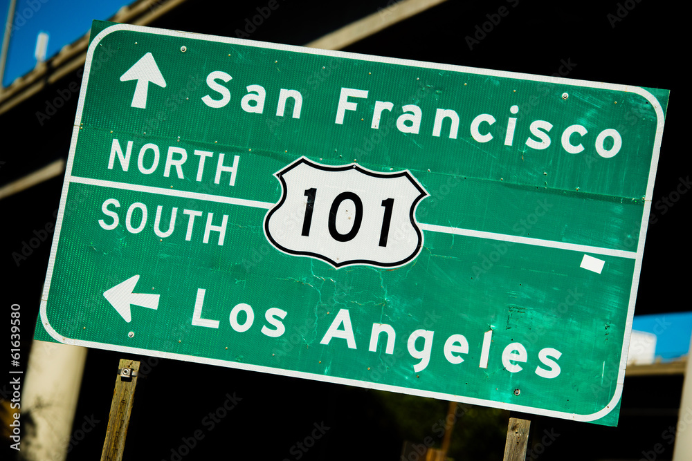 A green US 101 North/South highway sign