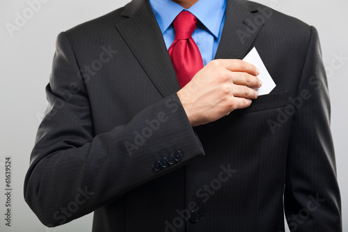 Businessman taking a business card