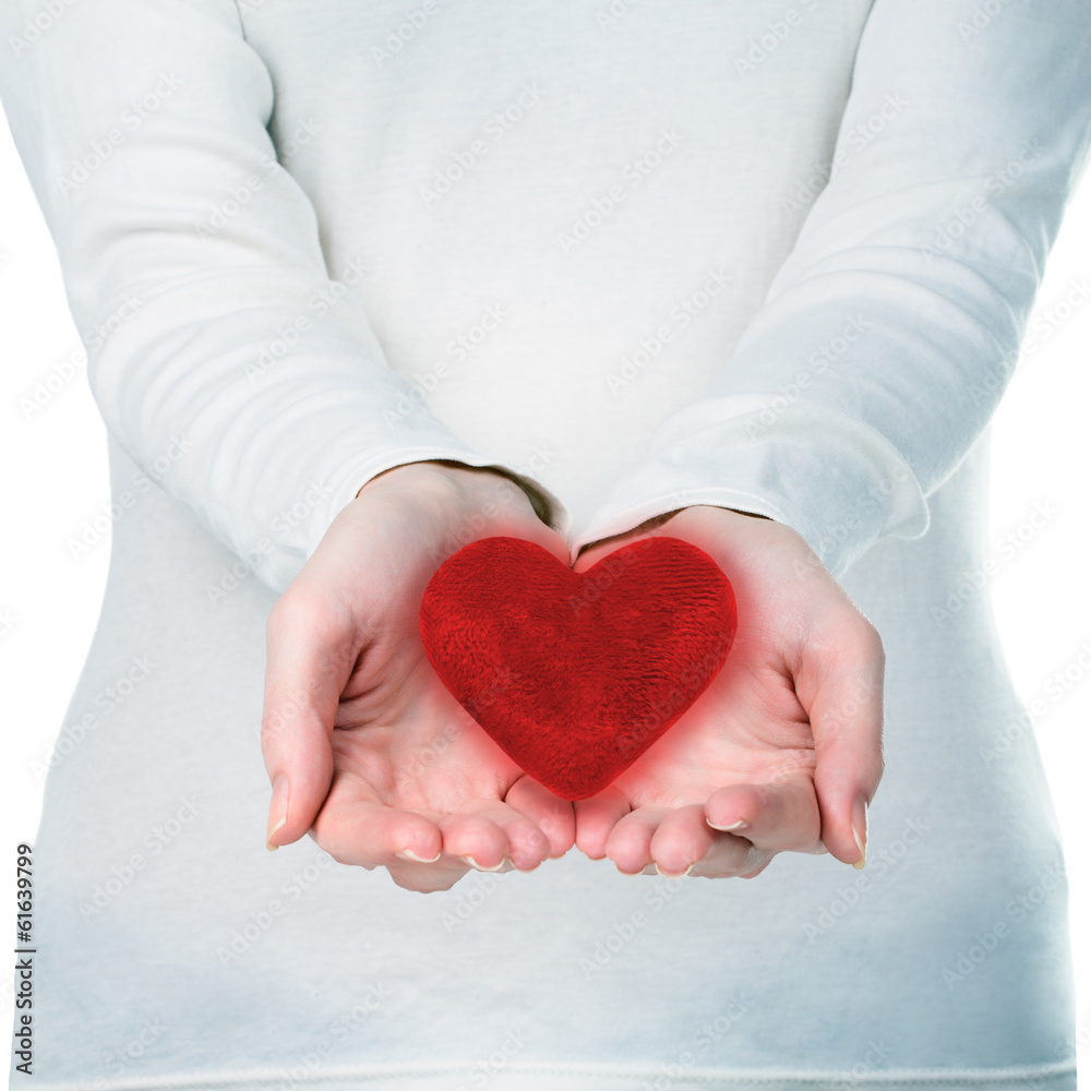 Woman hands with red heart. Family and relationships concept Woman hands with red heart. Family and relationships concept