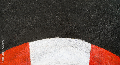 Fotografija Texture of race asphalt and curved curb Grand Prix circuit