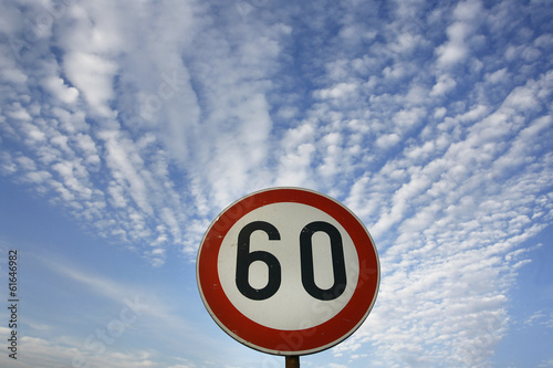 road sing speed limit on sixty