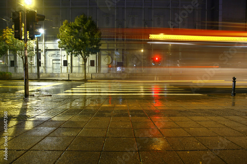 Long exposure traffic on road and pedestrian crossing