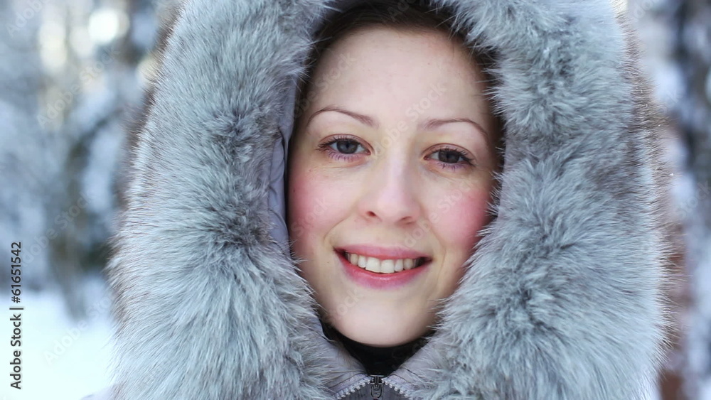 Young woman winter outdoors portrait. Young woman winter outdoors portrait.