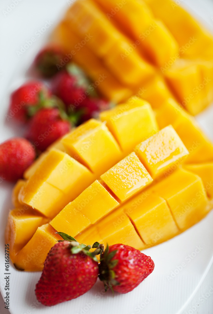 Healthy breakfast with mango, strawberry, honey and cereal Healthy breakfast with mango, strawberry, honey and cereal