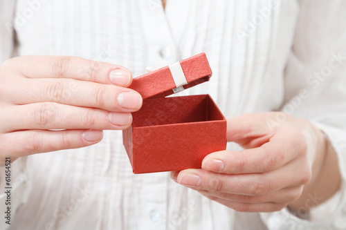 female opening gift box