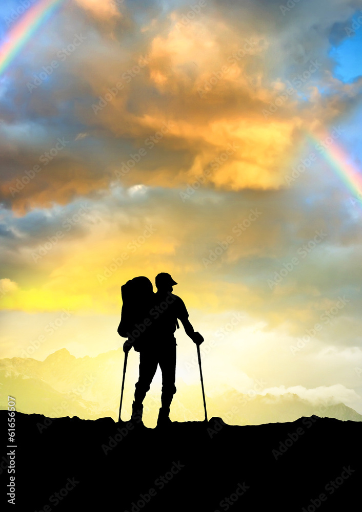 Silhouette of tourist in mountains. Sport and active life Silhouette of tourist in mountains. Sport and active life