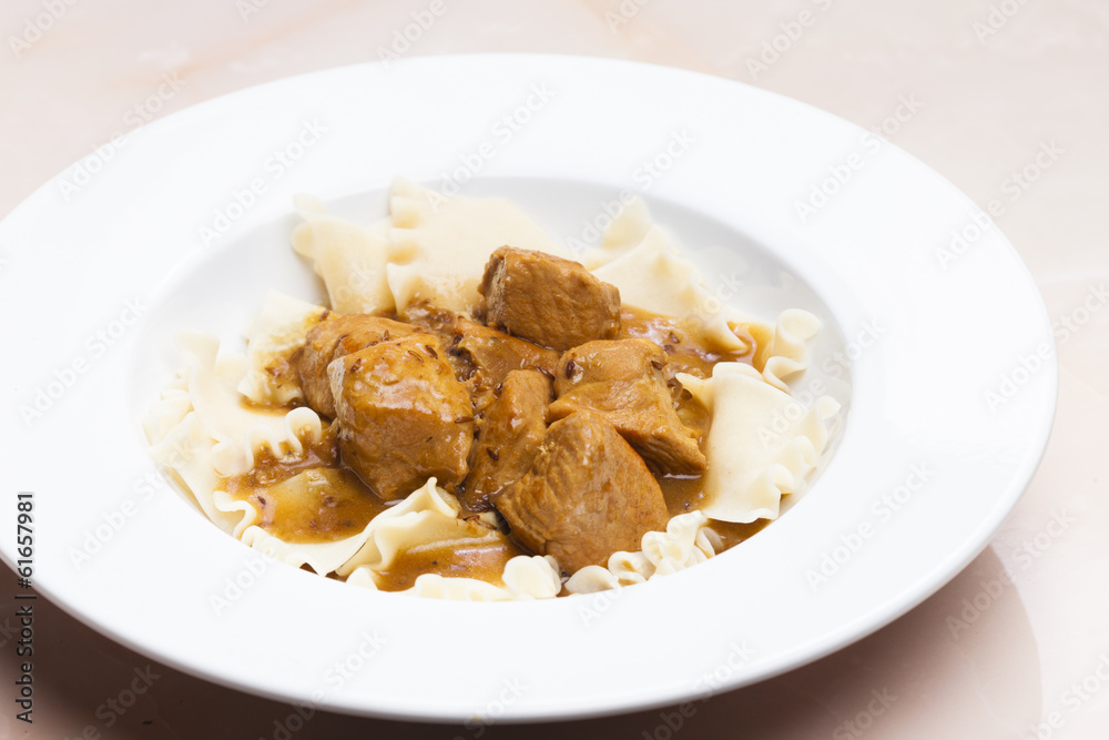 pork pieces on cumin with pasta pork pieces on cumin with pasta