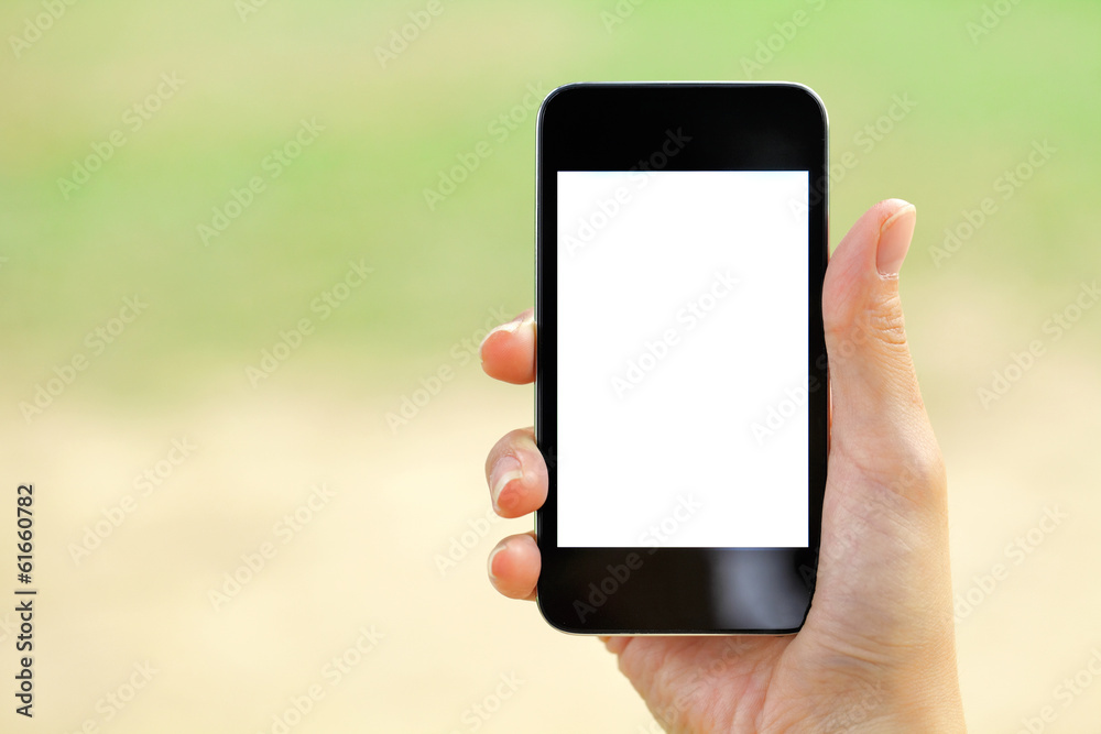 Blank screen mobile phone with woman hand
