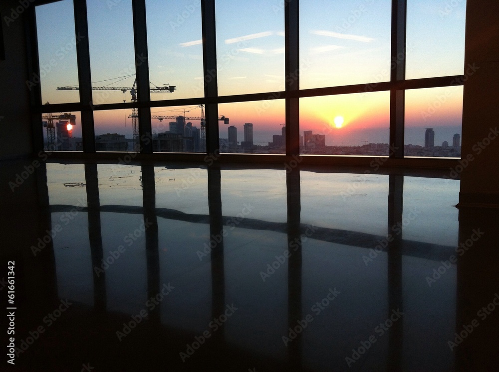 Fototapeta premium Sunset through window