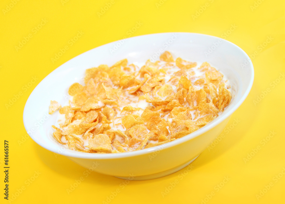 Healthy Breakfast-Cornflake on a yellow background Healthy Breakfast-Cornflake on a yellow background