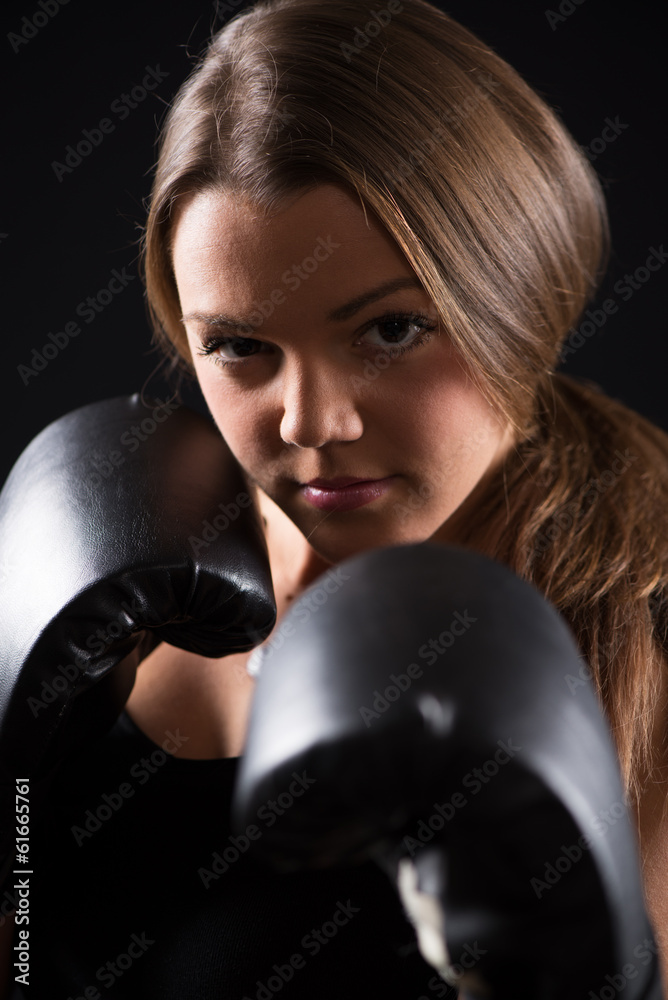 Portrait of Young beautiful boxing girl.