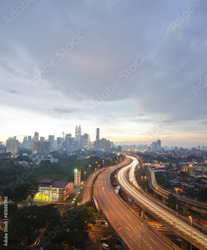 Sunset skyline of Kuala Lumpur city with Petronas Twin Towers or
