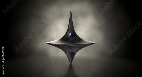 Die Cast Spinning Top Silhouetted