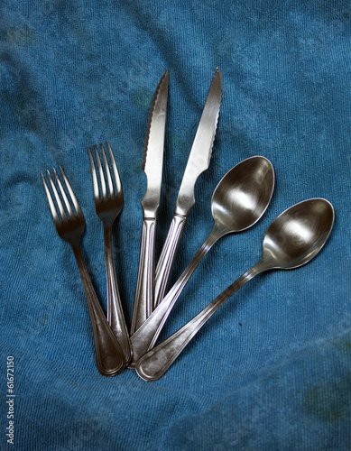 Cutlery in a texture blue background