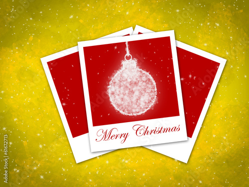 christmas ball frame on staryy yellow background photo