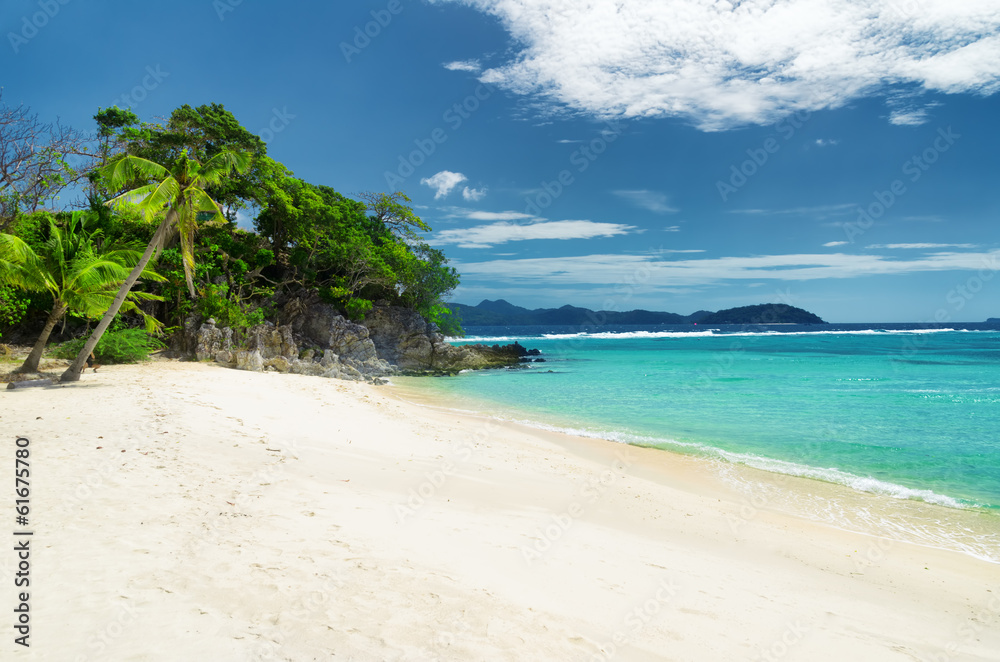White sand beach. Malcapuya island, Philippines