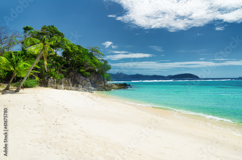 White sand beach. Malcapuya island, Philippines © efired