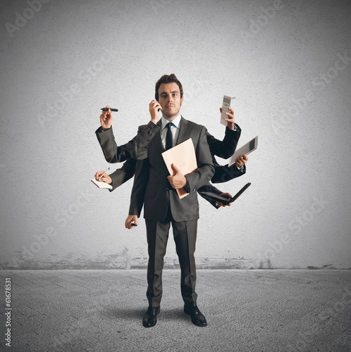 Multitasking businessman photo