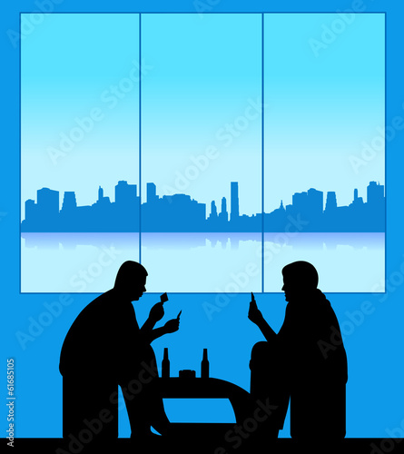 Men playing cards and drinking beer for fun silhouette