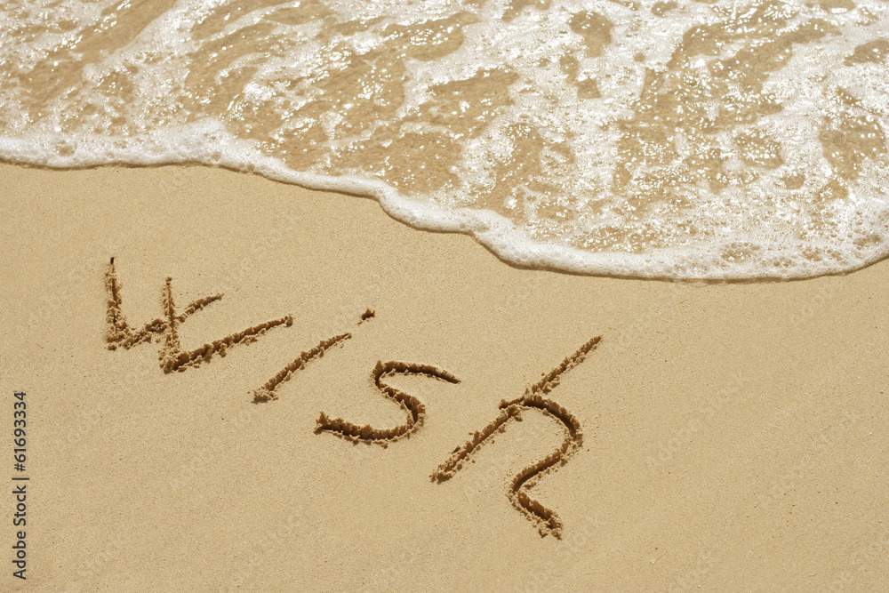 Fototapeta premium Conceptual text sand on beach