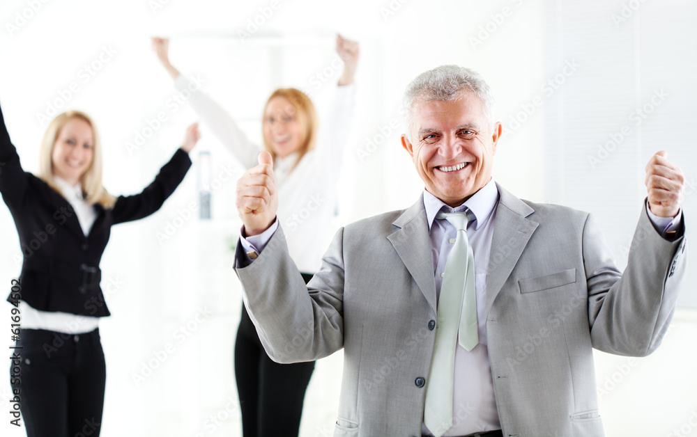 Success senior businessman showing thumbs up Success senior businessman showing thumbs up