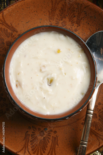Shrikhand  is an Indian sweet dish made of strained yogurt photo