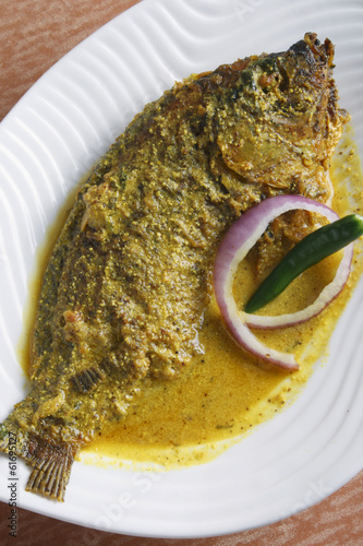 Maacher jhol - a Bengali Fish Curry photo