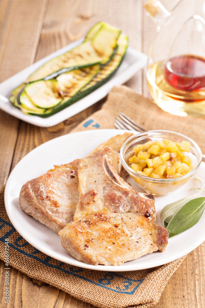 Pork cutlets on a bone with apple chutney Pork cutlets on a bone with apple chutney