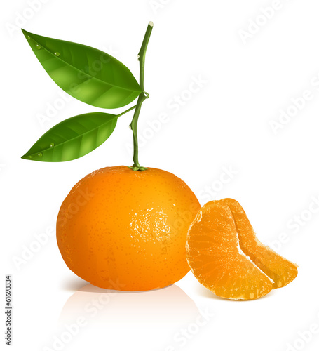 Fresh tangerine with green leaves and slices.