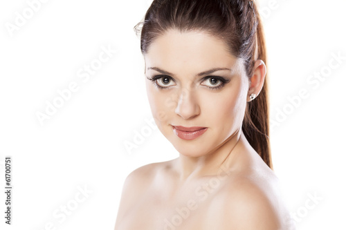 beautiful young woman posing on a white background
