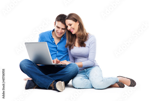Young couple with laptop computer