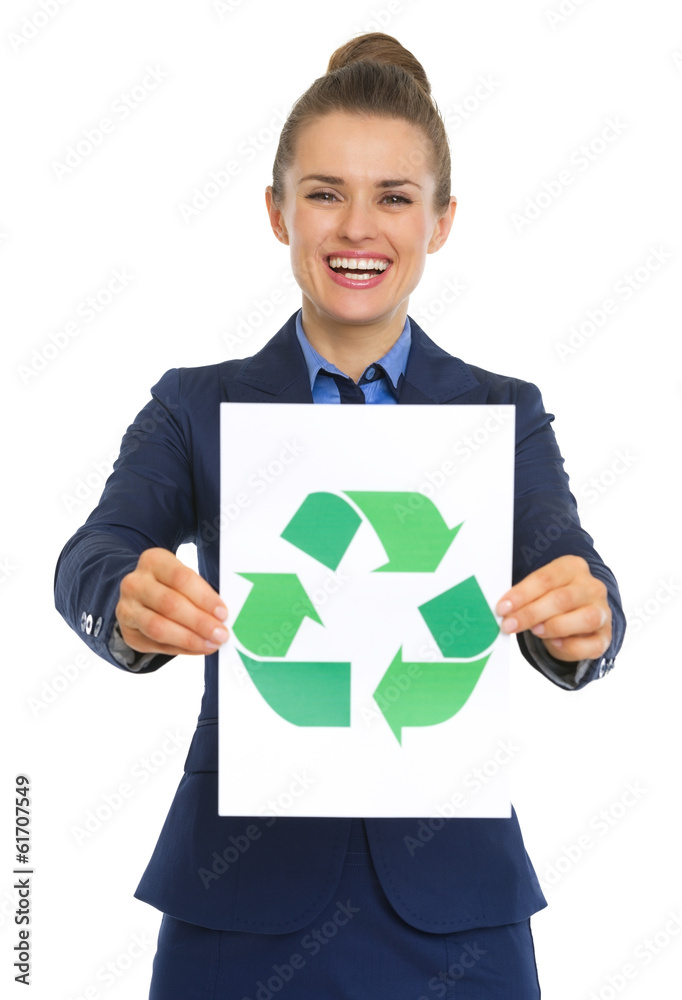 Business woman showing paper sheet with recycle sign