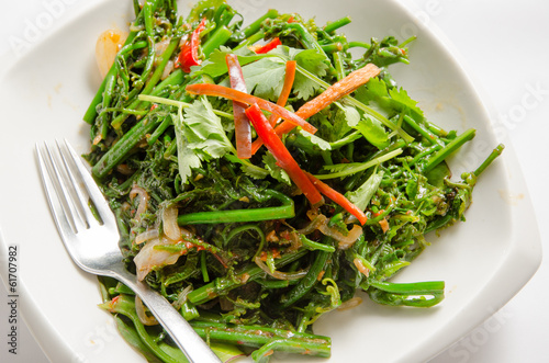Stir fried vegetable on a white plate
