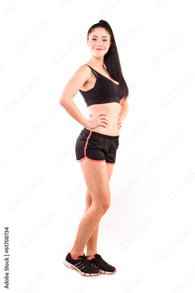 studio portrait of a beautiful laughing sporty woman studio portrait of a beautiful laughing sporty woman