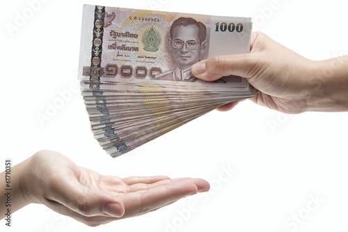 Hand with money isolate on white