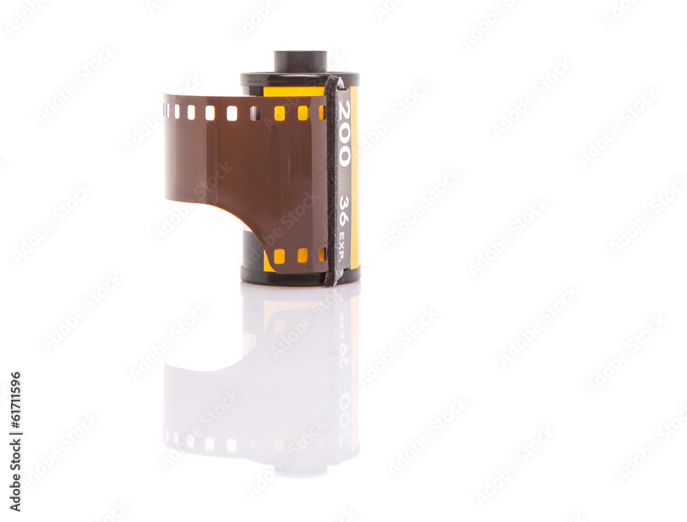 35mm still camera film cartridge over white background