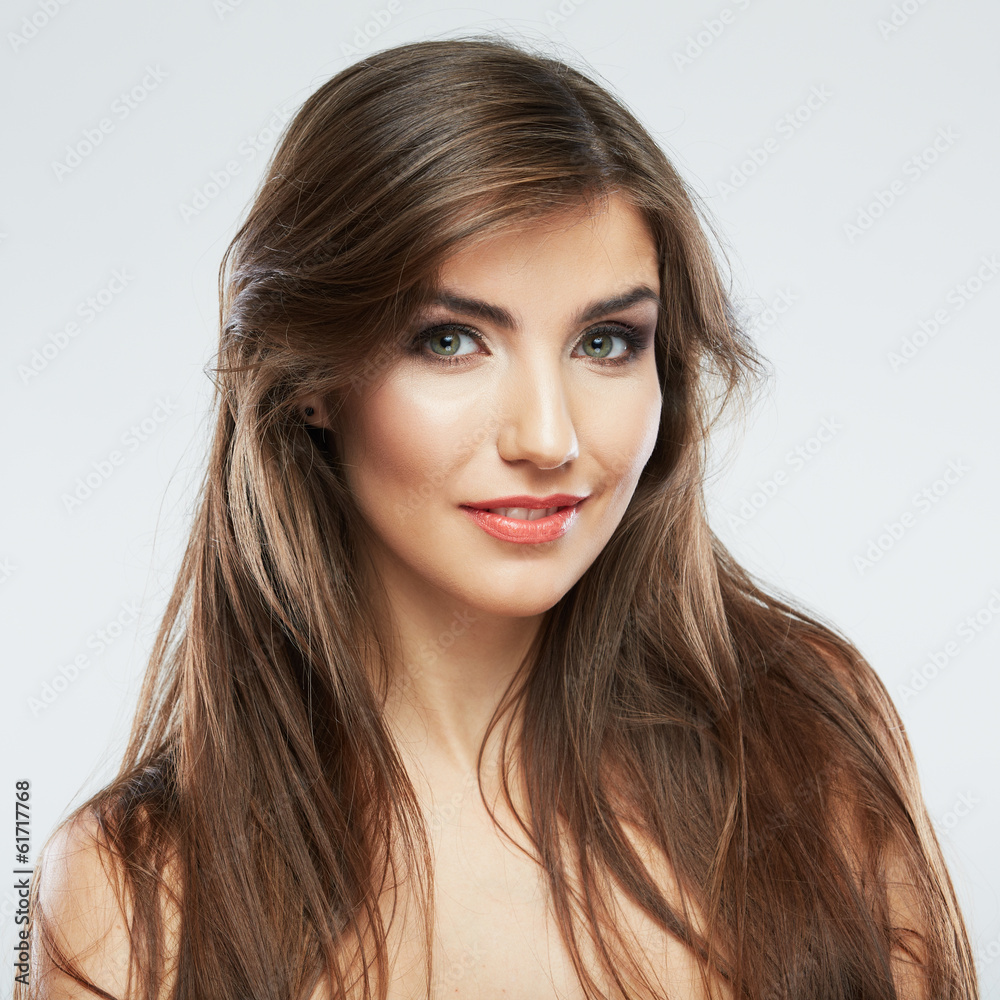Woman face with hair motion on white background Woman face with hair motion on white background