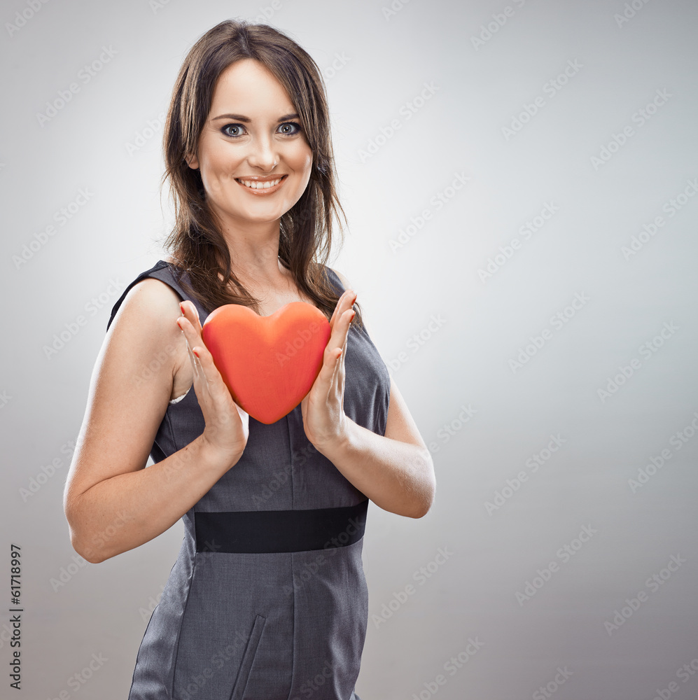 Smiling Business woman hold heart. Smiling Business woman hold heart.