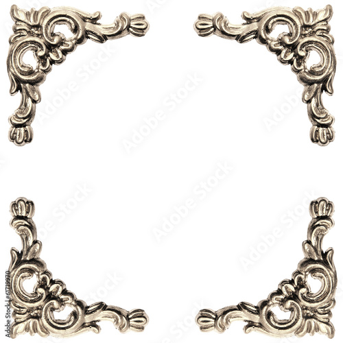 silver colored elements of baroque carved frame photo