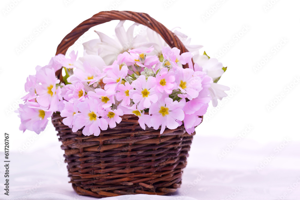 pink and withe flower in brown basket